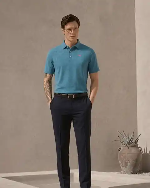 13 Classy Summer Outfit Ideas for Men That Beat the Heat in Style 15 13. Vibrant Polo and Tailored Trousers