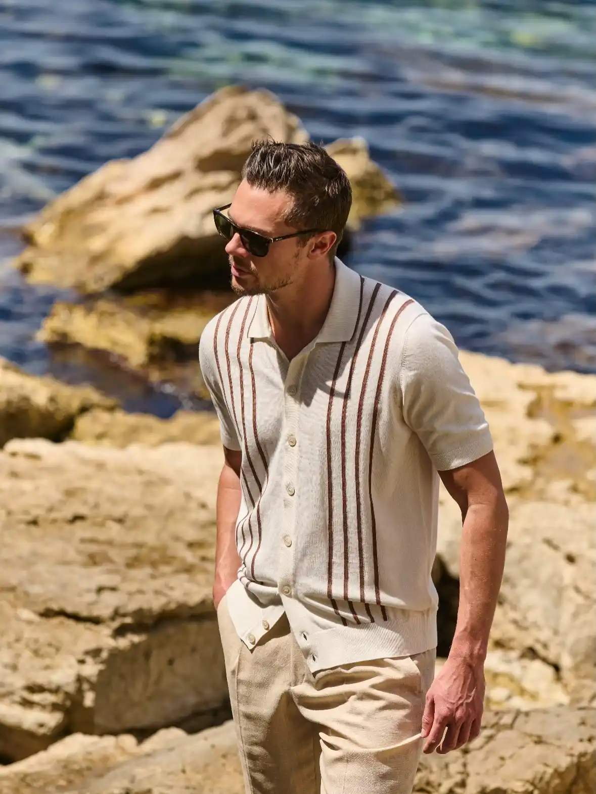 13 Classy Summer Outfit Ideas for Men That Beat the Heat in Style 13 11. Striped Knit Shirt and Linen Trousers