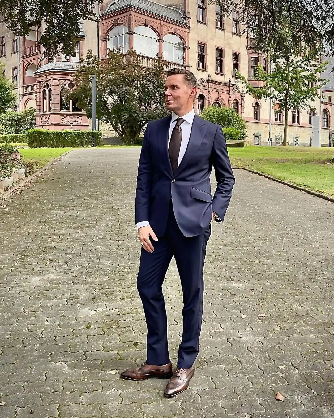 9. The Navy Suit and Silk Tie