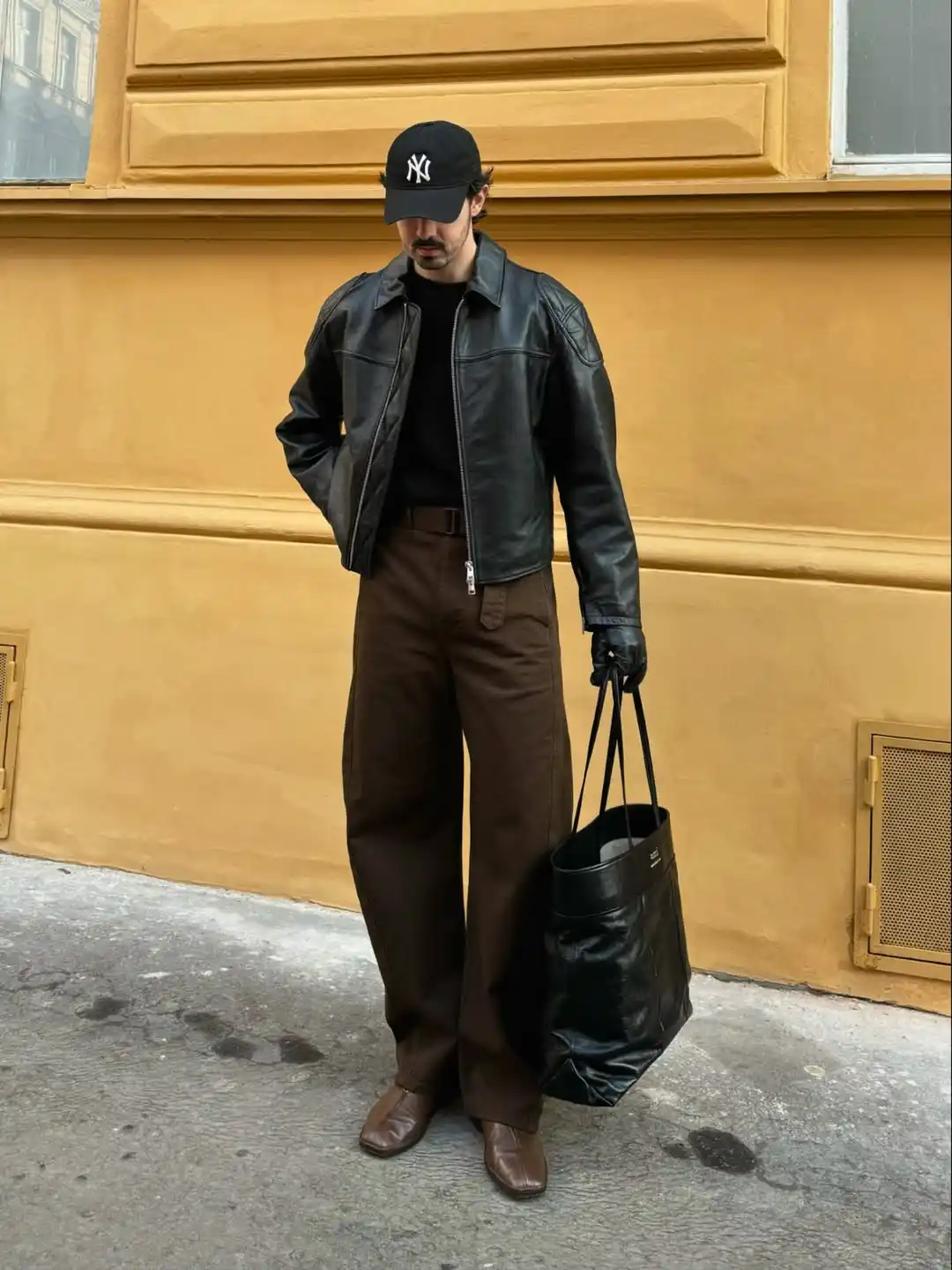 15 Classy Streetwear Outfit Ideas for Men That Elevate the Game 4 2. Leather Jacket and Wide Leg Trousers