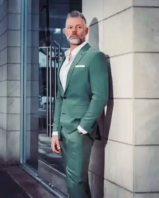 13. The Sage Green Suit and Crisp White Shirt