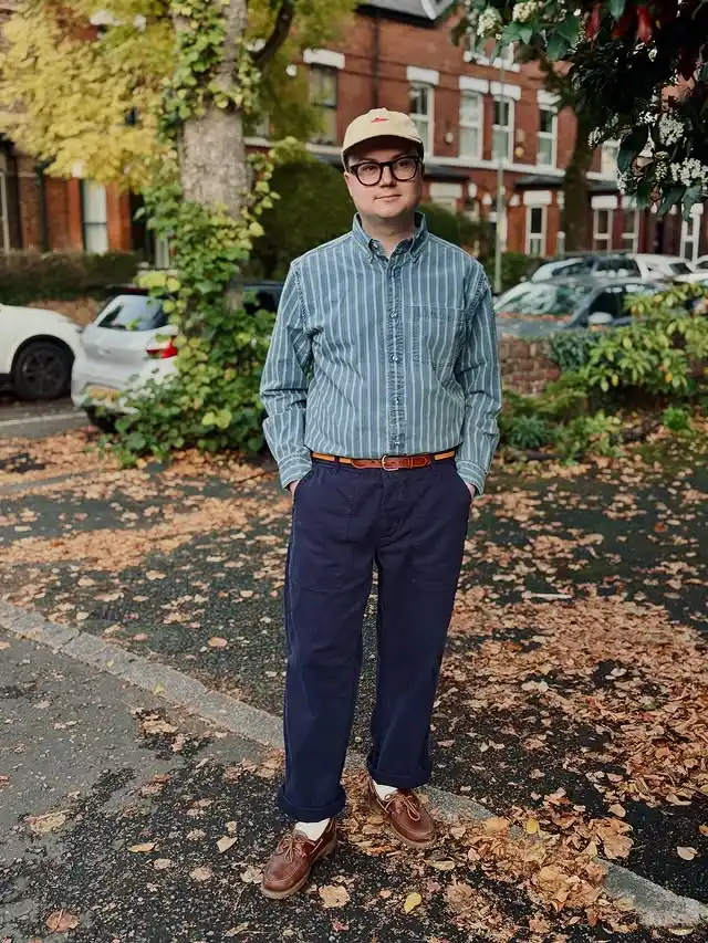 15 Classy Streetwear Outfit Ideas for Men That Elevate the Game 15 13. Striped Button Down and Navy Workwear Pants