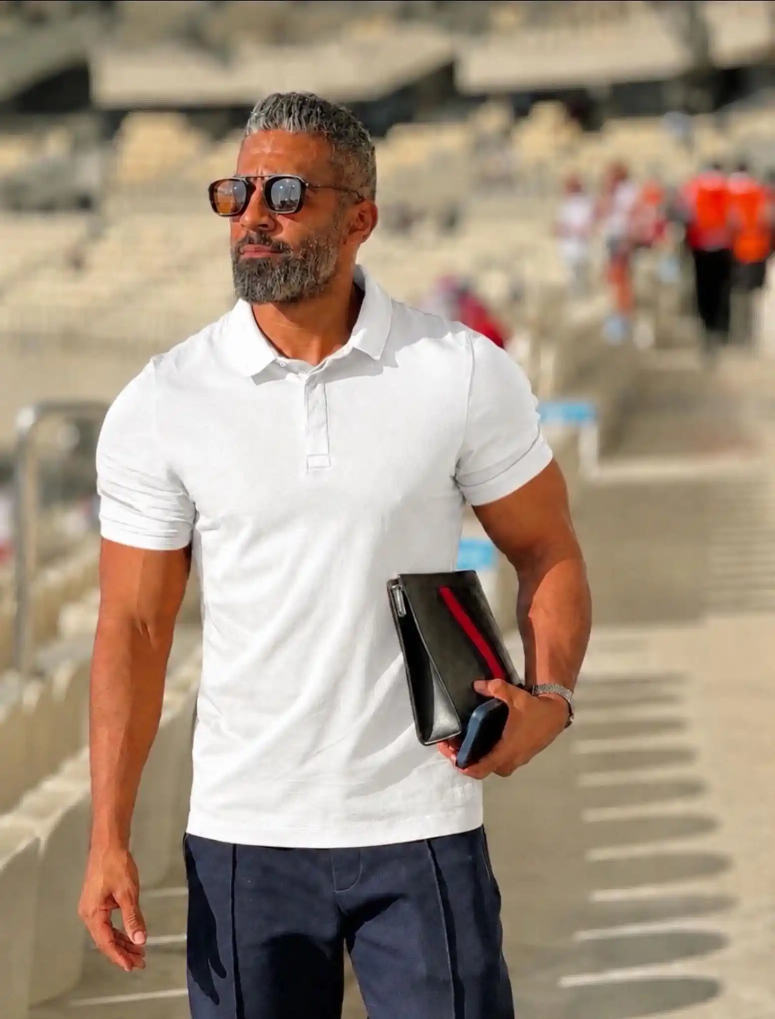 7. White Polo and Dark Trousers