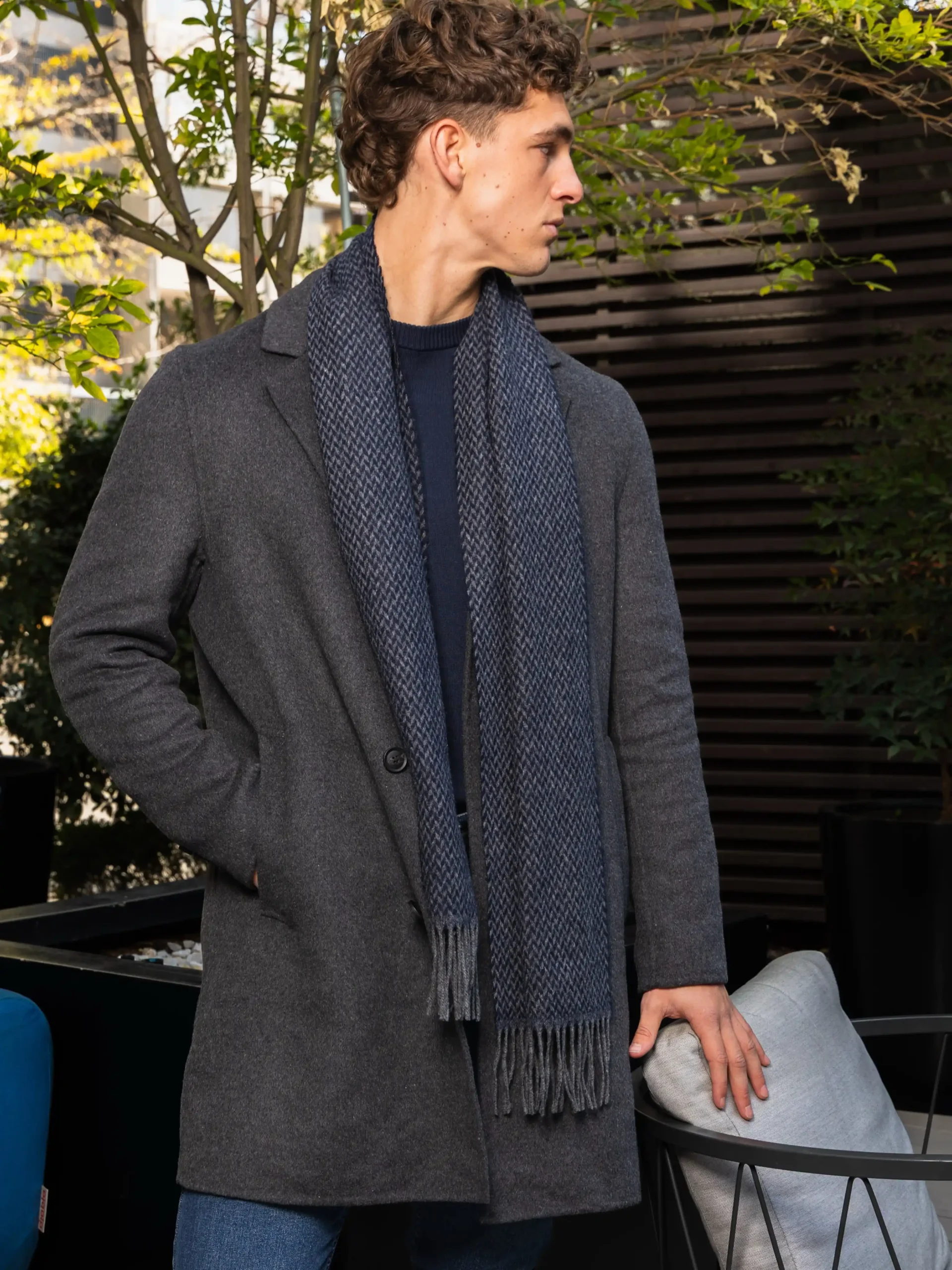 15 Classy Winter Outfit Combos for Men 8 6. Single-Breasted Charcoal Overcoat and Herringbone Scarf