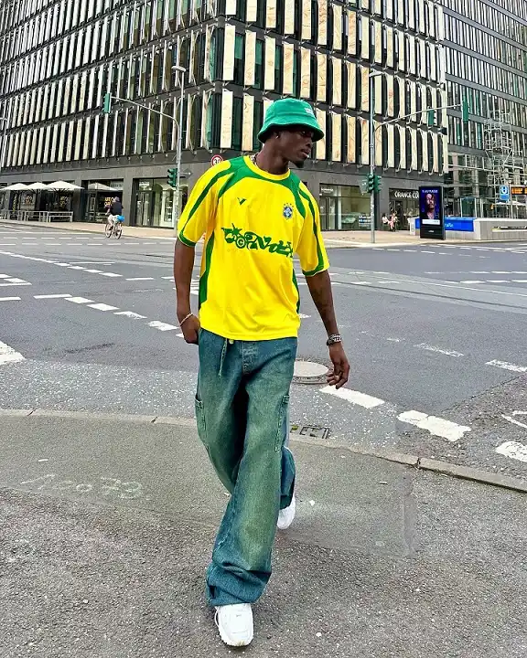 17 Soccer Jersey Streetwear Outfit Ideas for Men 15 Brazil Jersey with Baggy Washed Denim