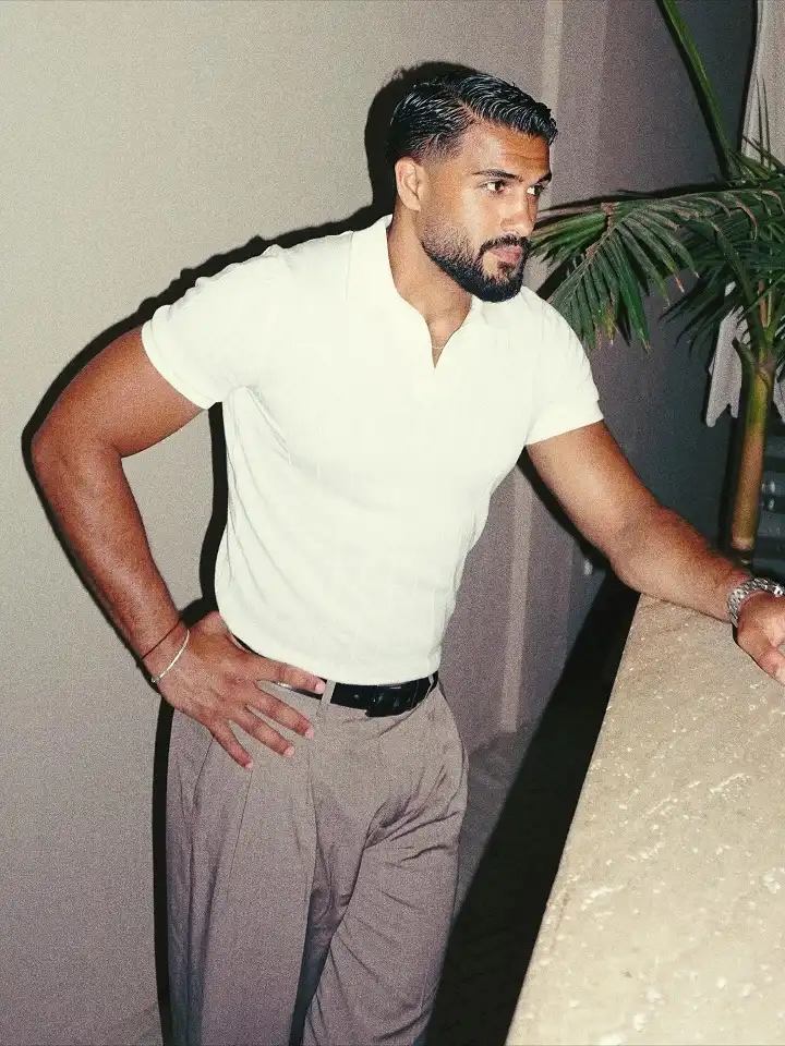 20 Classy Outfit Ideas for Tall Men That Actually Work 13 The Popover Polo Tuck That Reads Expensive, Not Try Hard