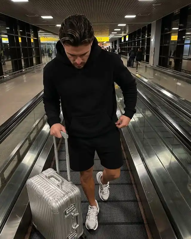 14. Minimalist Black Hoodie and Sweat Shorts