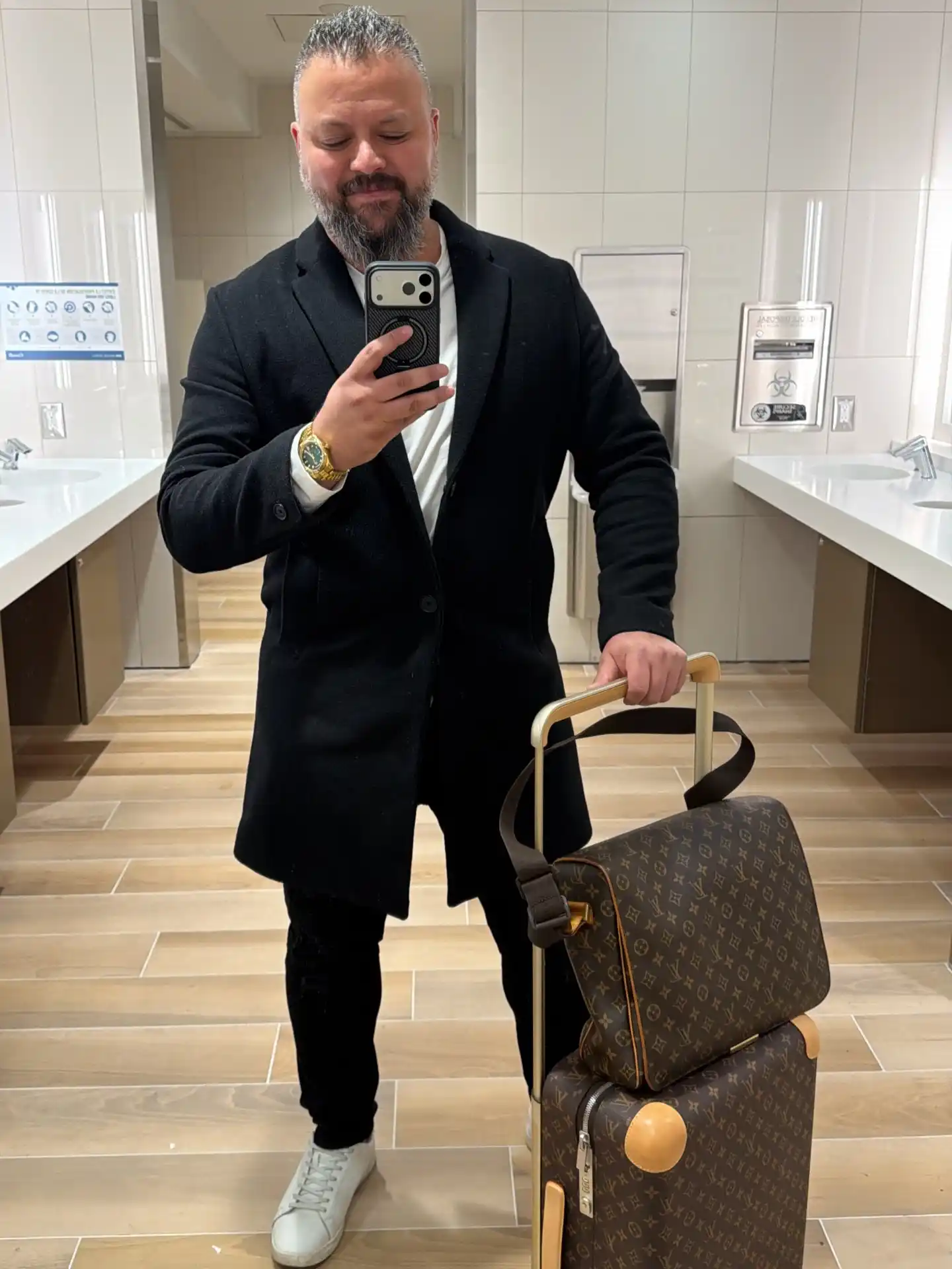 9. The Smart Tailored Coat and Monogram Luggage