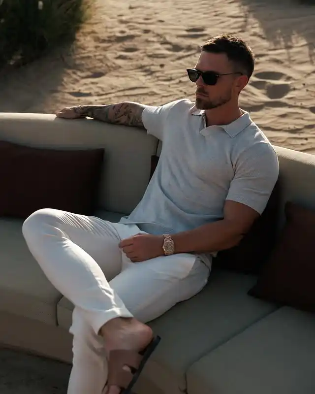 17 Resort‑Ready Men’s Outfits for Tropical Vacations 5 4. Knit Polo and Tailored Trousers