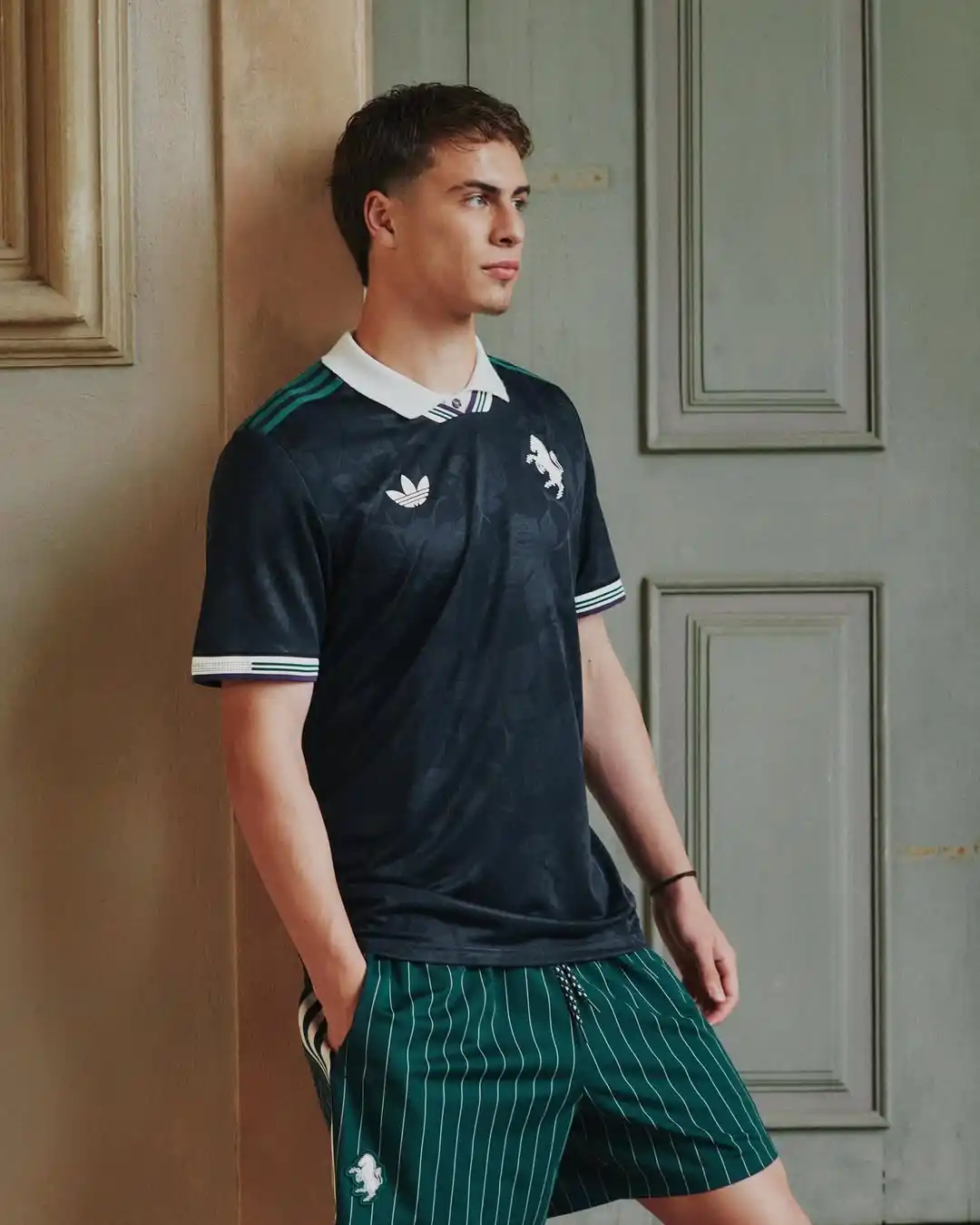 8. Dark Black Adidas Retro Soccer Jersey With Teal Pinstripe Shorts