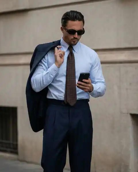 1. Crisp Light Blue Shirt and Navy Pleated Trousers
