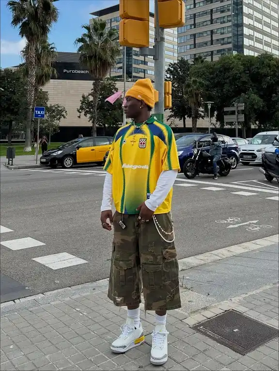 17 Soccer Jersey Streetwear Outfit Ideas for Men 7 Brazil Shirt Layered Over a Long Sleeve