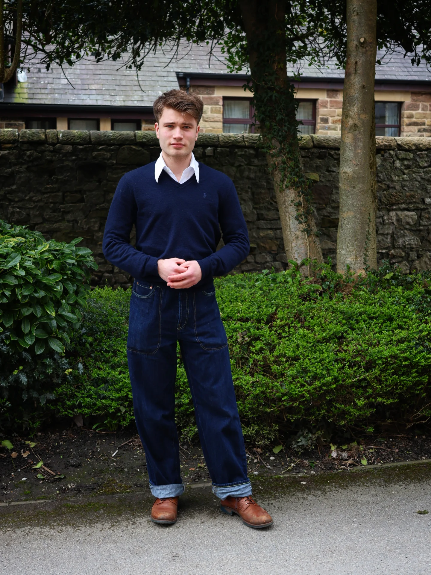 2. The V-Neck Pullover and Wide-Leg Denim