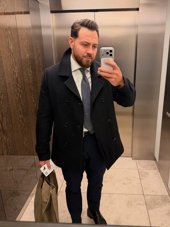 16 Stylish Airport Outfits for Men on Business Trips 6 The Overcoat Layer That Keeps a Full Suit Looking Sharp on Cold Travel Days