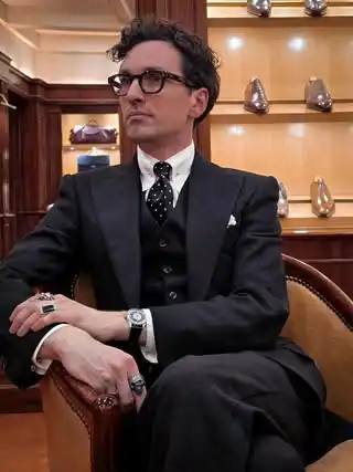 2. The Three Piece Black Suit