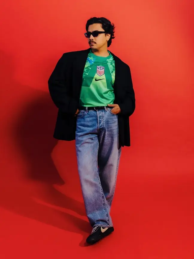 Green Goalkeeper Jersey Under a Structured Blazer