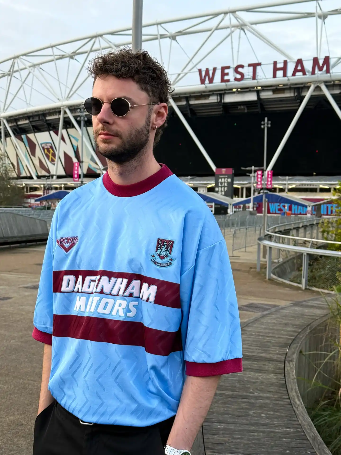 10. Vintage West Ham Away Jersey With Black Trousers Outside The Stadium