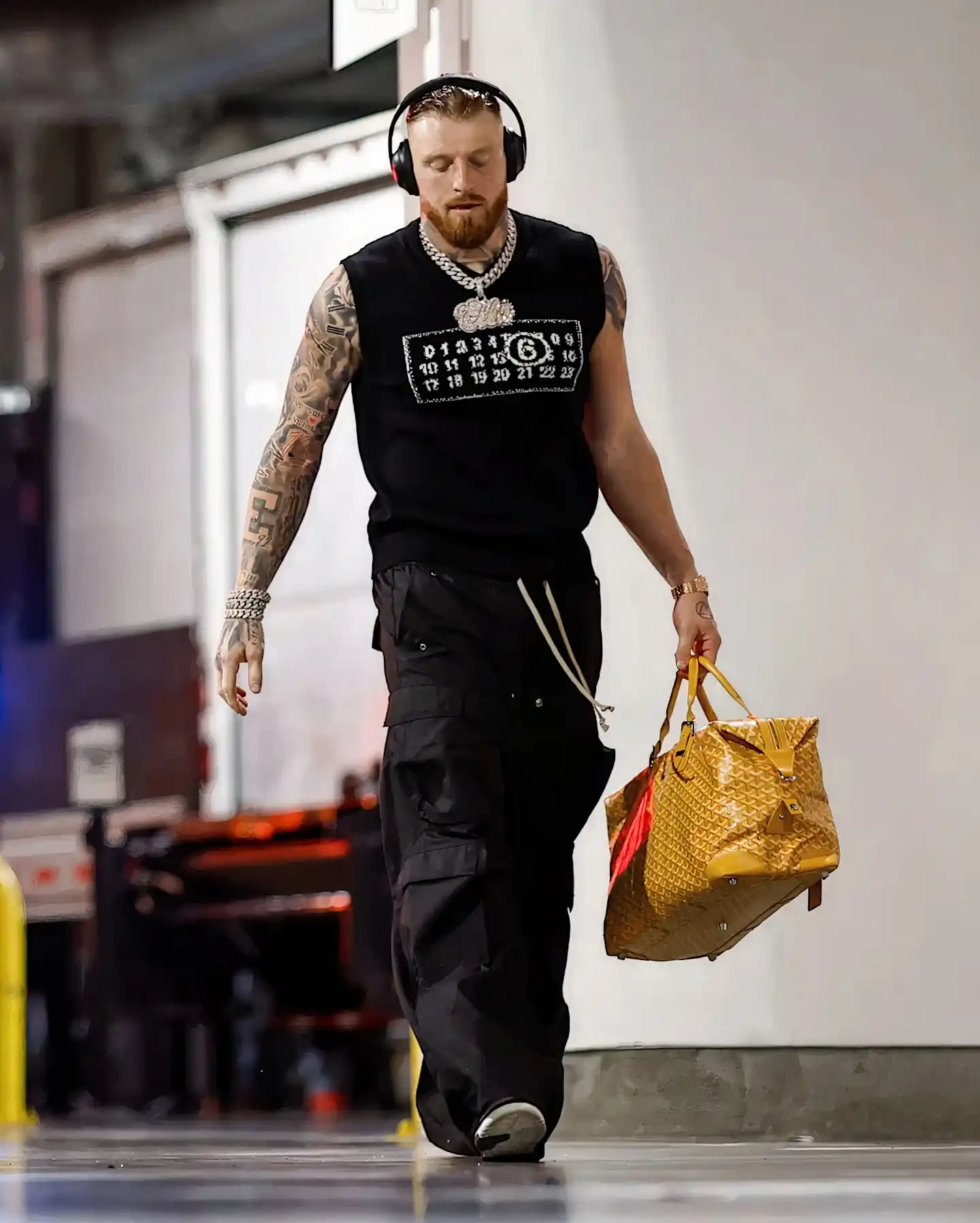 1. Black Soccer Jersey With Cargo Pants and Designer Bag