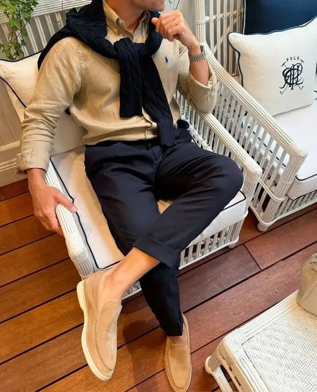 16 Airport Outfit Ideas for Men Over 40 Looks That Feel Age-Appropriate 4 A Sweater Over the Shoulders Beats a Jacket You Have to Carry