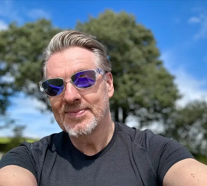 Grey Hair Styles for Men Over 50: 18 Looks That Command Respect 7 Side-Swept and Kept Short, Made for an Active Day Outside
