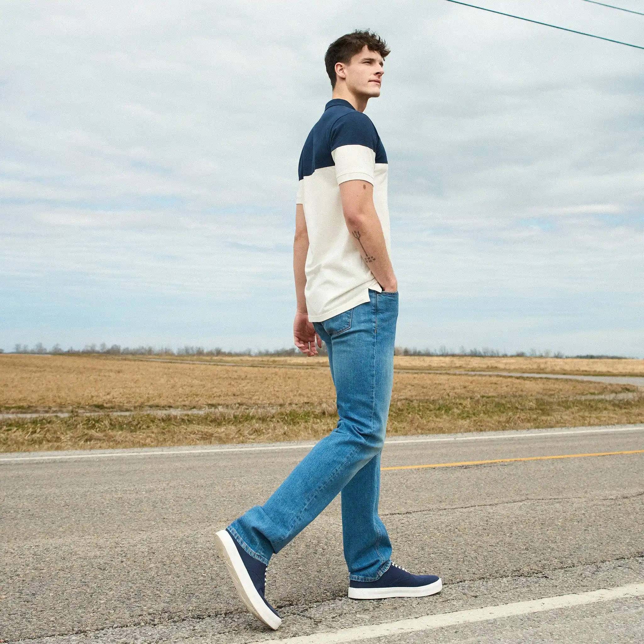 5. Color Block Polo and Classic Denim Layering
