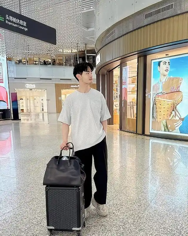 3. Minimalist Oversized Tee and Relaxed Trousers