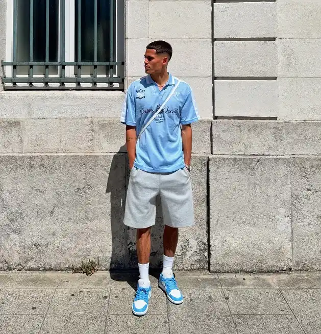 17 Soccer Jersey Streetwear Outfit Ideas for Men 2 Light Blue Club Shirt with Fleece Shorts