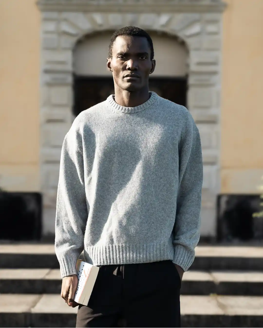 14. Classic Grey Crewneck Sweater and Black Trousers