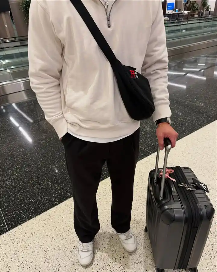 13 Airport Outfit Men Winter Combos for Cold Layovers 14 13. Fleece Quarter Zip and Dark Trousers