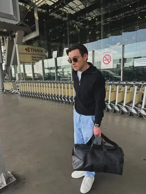 13 Airport Outfit Men Winter Combos for Cold Layovers 11 10. Quarter Zip Sweater and Light Denim