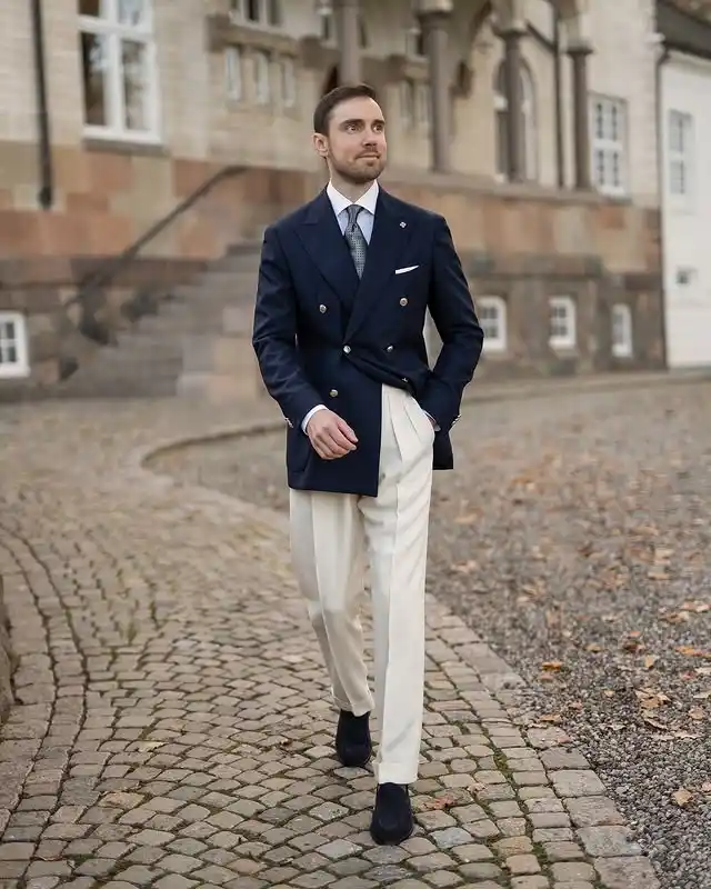 15 Minimalist Weekend Outfits for Men (Casual & Cozy) 5 4. Double Breasted Blazer and Pleated Trousers