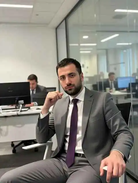 4. Tailored Grey Suit with Purple Tie