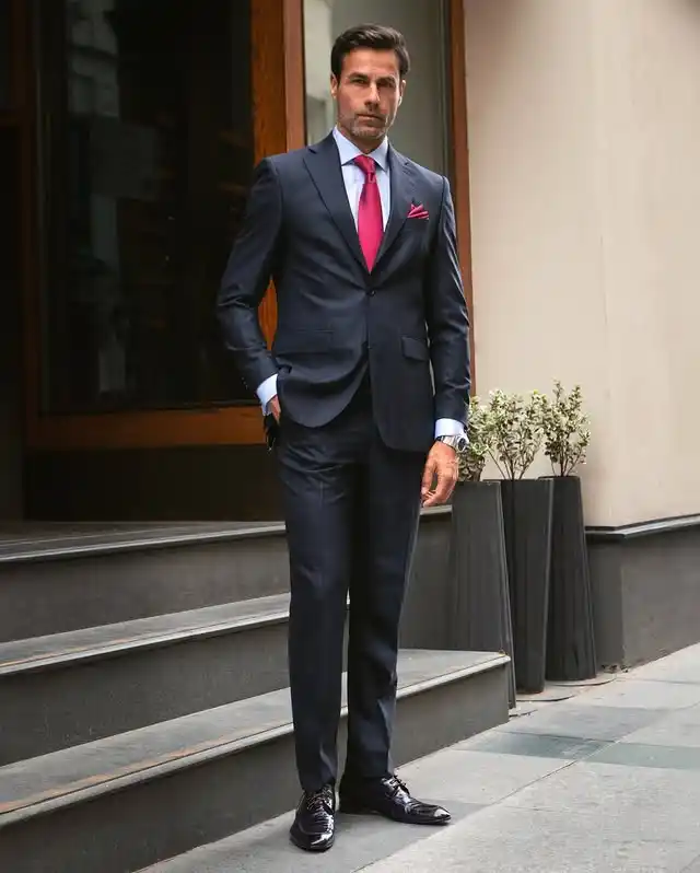 10. The Subtle Dark Pinstripe Suit