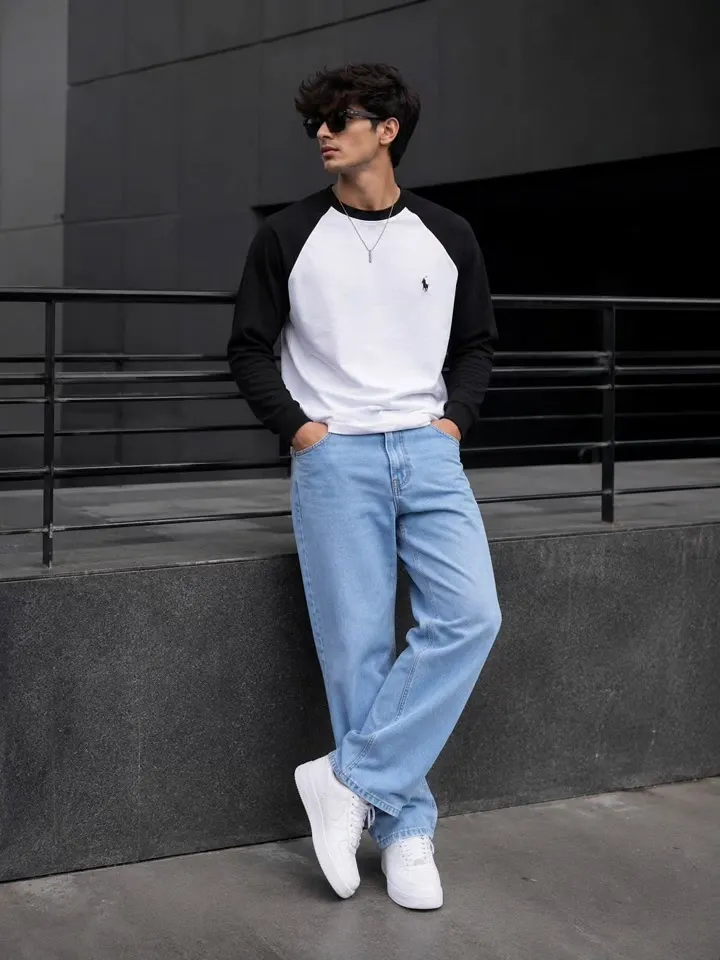 19 Classy Everyday Outfits for College Guys 10 A Raglan Sweatshirt and Wide Jeans for Off-Duty Days