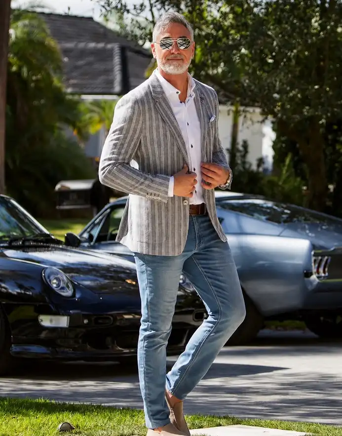 16 Stylish Airport Outfits for Men on Business Trips 3 Striped Linen and Light Wash Denim for a Trip That Ends Somewhere Warm