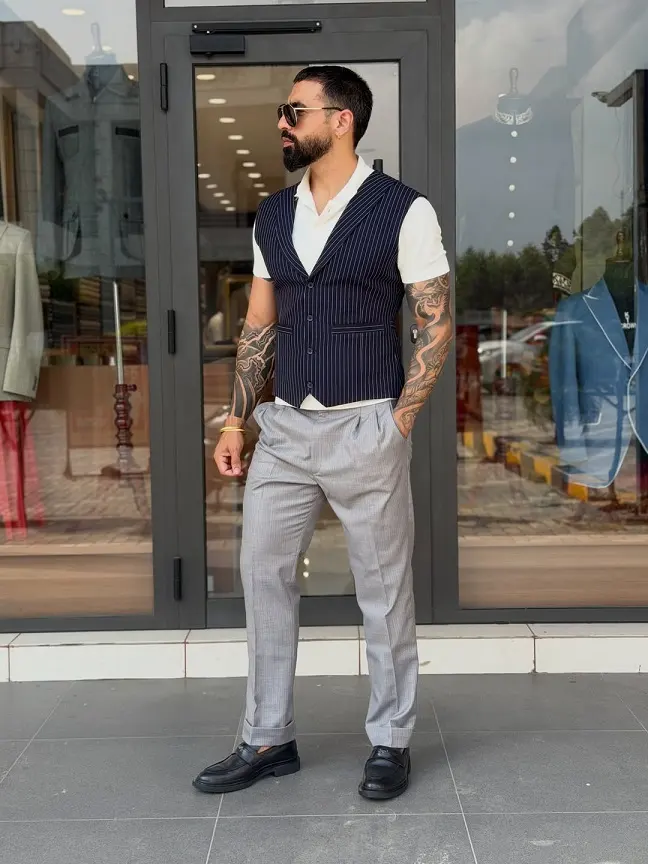 Navy Pinstripe Vest Over a White Polo
