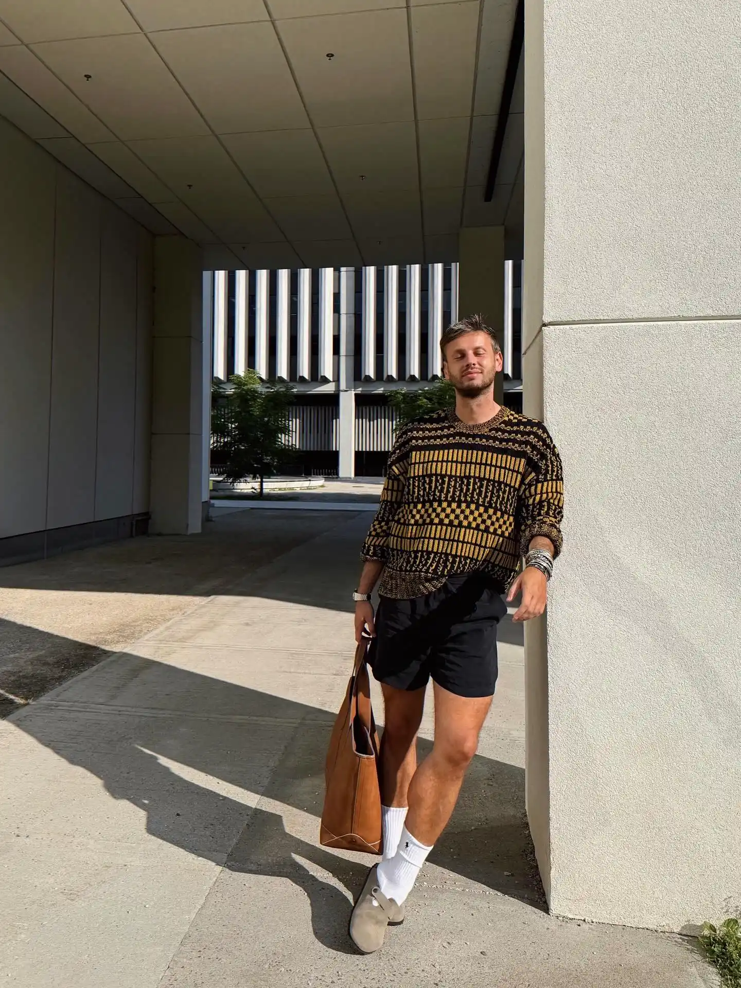 3. Patterned Sweater and Dark Shorts