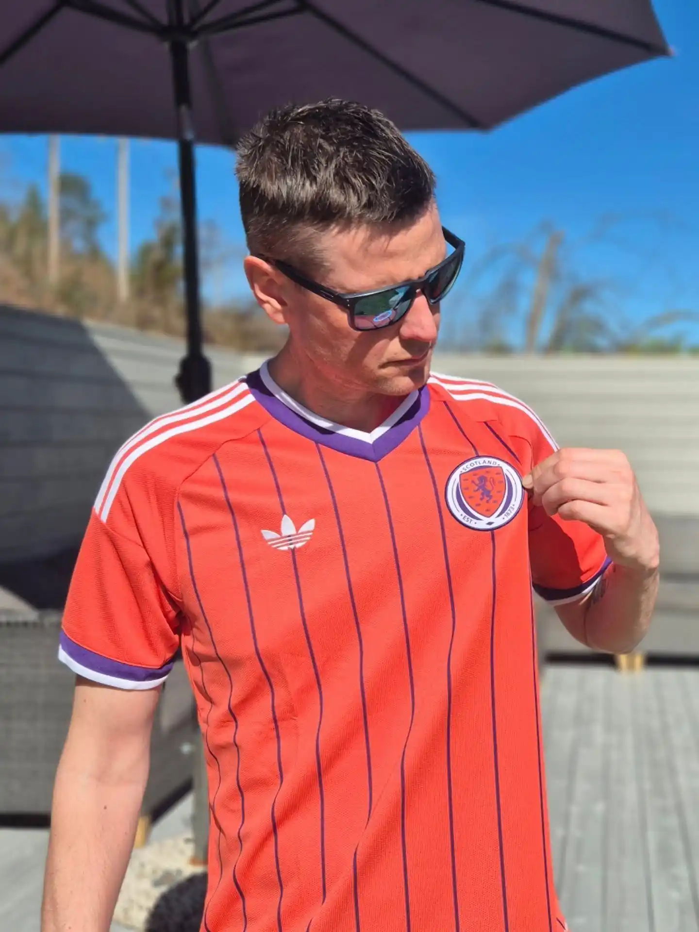 6. Retro Orange Pinstripe Soccer Jersey With Sport Sunglasses