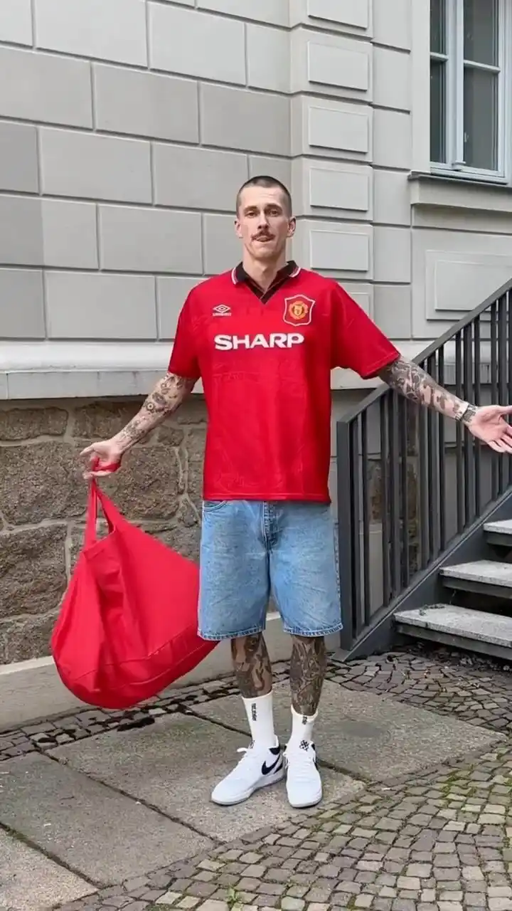 8. Vintage Manchester United Jersey With Denim Shorts