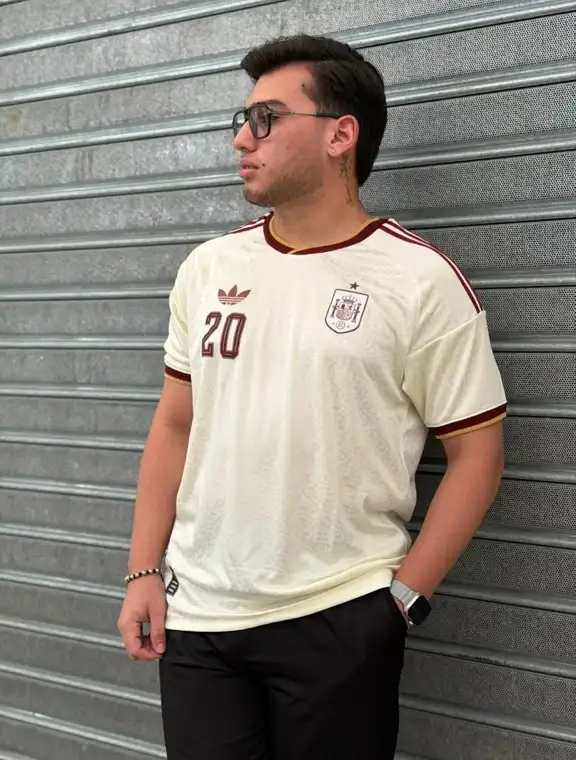 25 Soccer Jersey Outfit Men Business Casual Combos That Work 10 Cream Spain Jersey with Black Pants