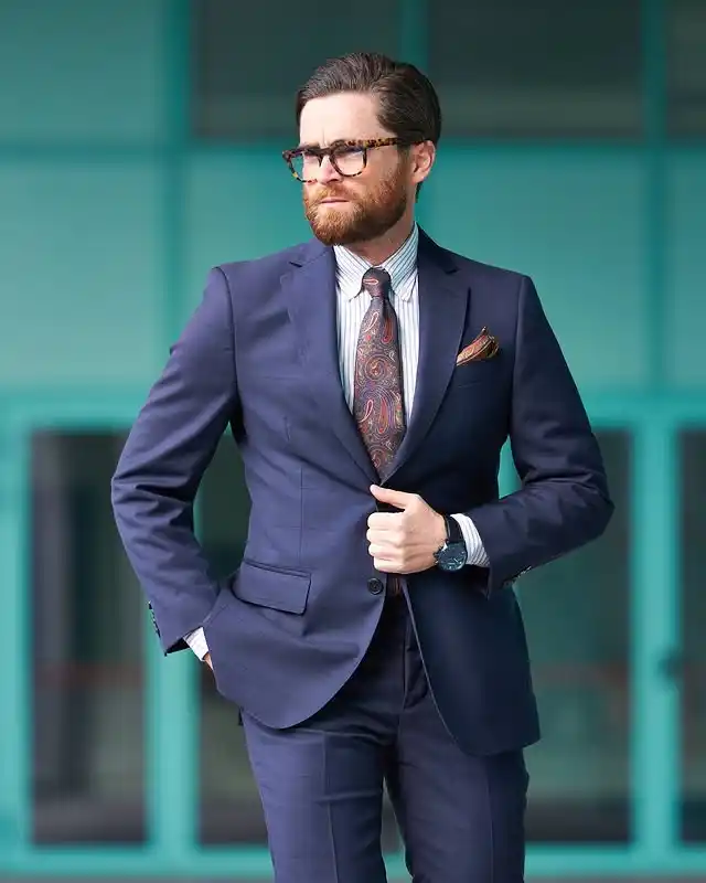13 Classy Outfits Men Holiday Party Looks for Festive Season 13 12. Classic Blue Suit with Paisley Pattern Accents
