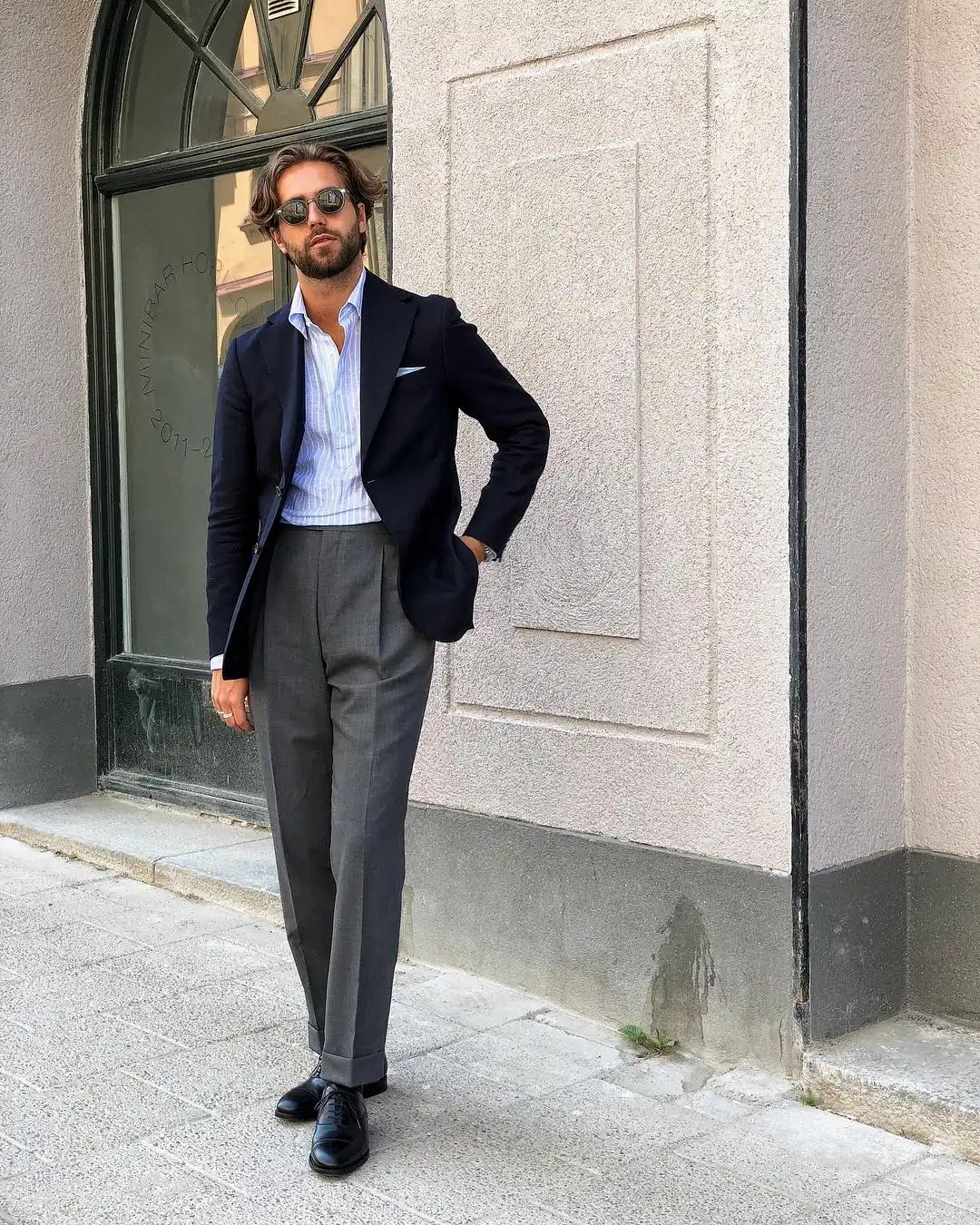 Tall Men’s Office Outfits Ideas: 10 Professional Styles 9 8. The Classic Blazer and Pleated Trousers