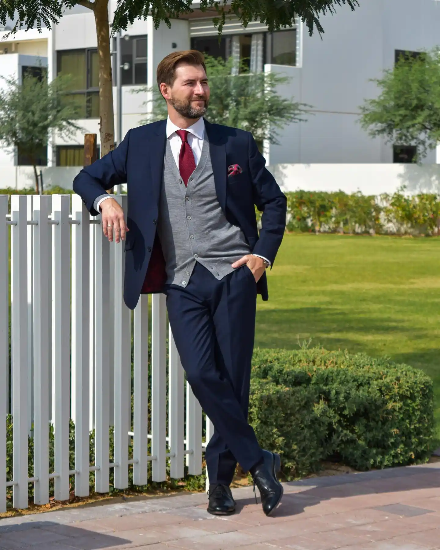 12. Buttoned Vest Cardigan and Tailored Suit Layering