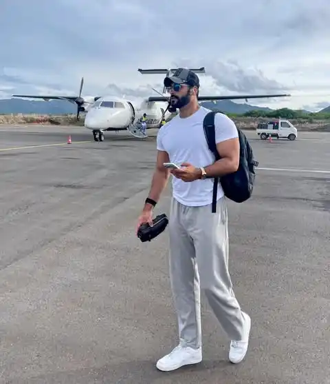 11 Airport Outfit Men Tall Guys Swear By 9 8. The Athletic Tee and Relaxed Grey Trousers Flight Look