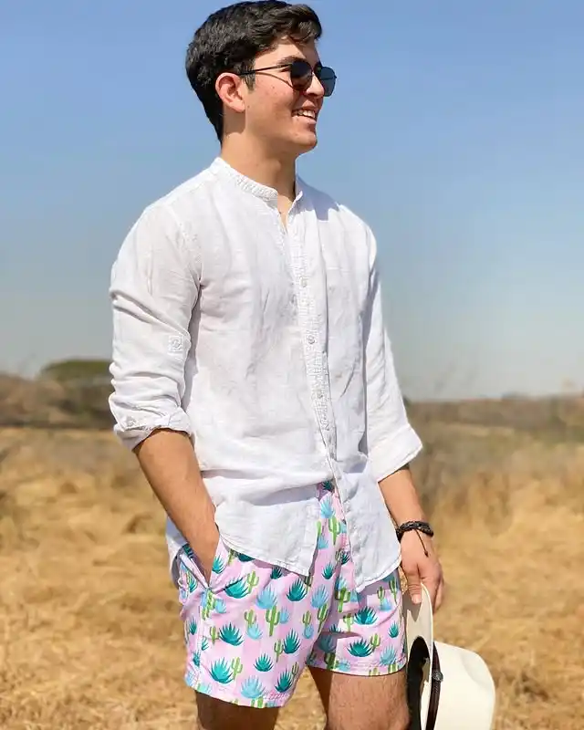 12 Casual Outfits for Tall Men (Beyond Oversized Hoodies) 11 9. Linen Grandad Shirt and Patterned Swim Shorts