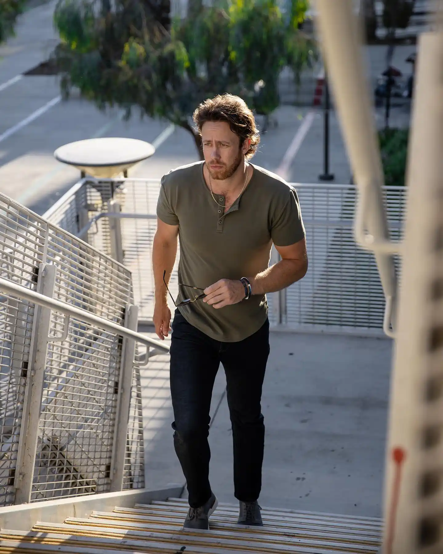 17 Shirt Styles for Tall Men That Actually Fit 16 15. Short Sleeve Olive Henley