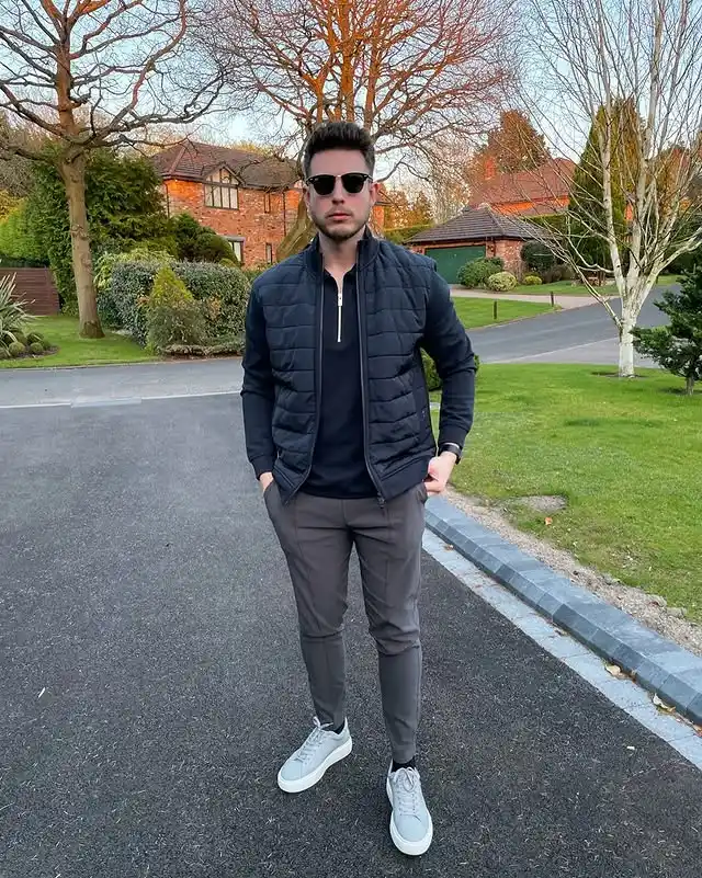12 Casual Outfits for Tall Men (Beyond Oversized Hoodies) 12 10. Quilted Vest and Fitted Trousers