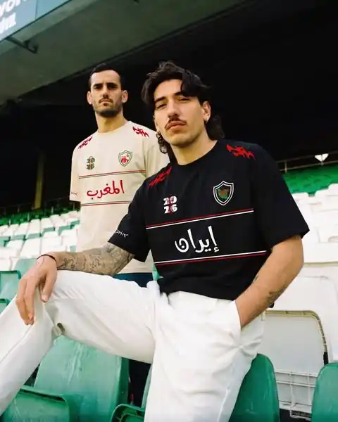 11. Graphic Black Jersey and White Trousers