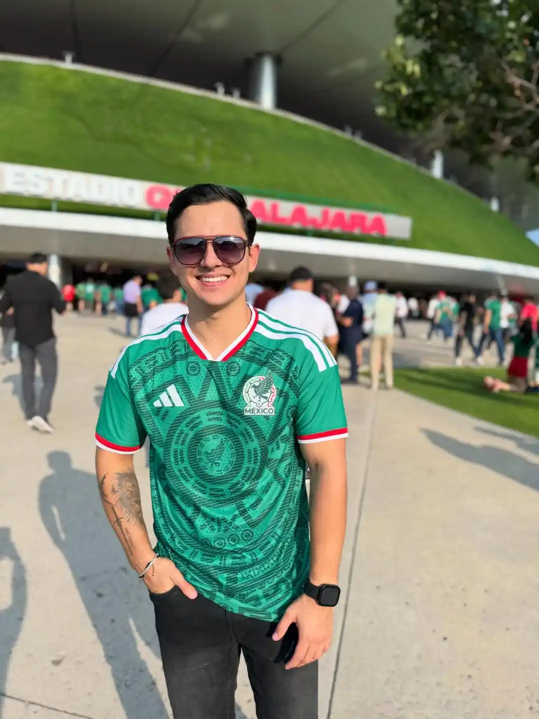 13. Green Mexico Jersey With Aviator Sunglasses and Dark Jeans