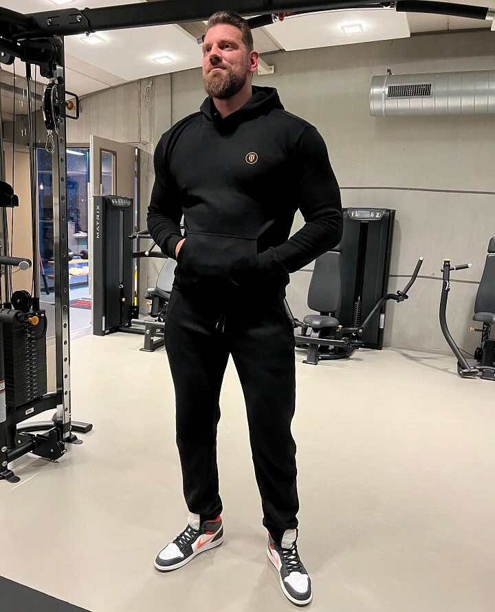 20 Classy Outfit Ideas for Tall Men That Actually Work 11 Matching Black Sweats Done the Elevated Way, Not the Lazy Way